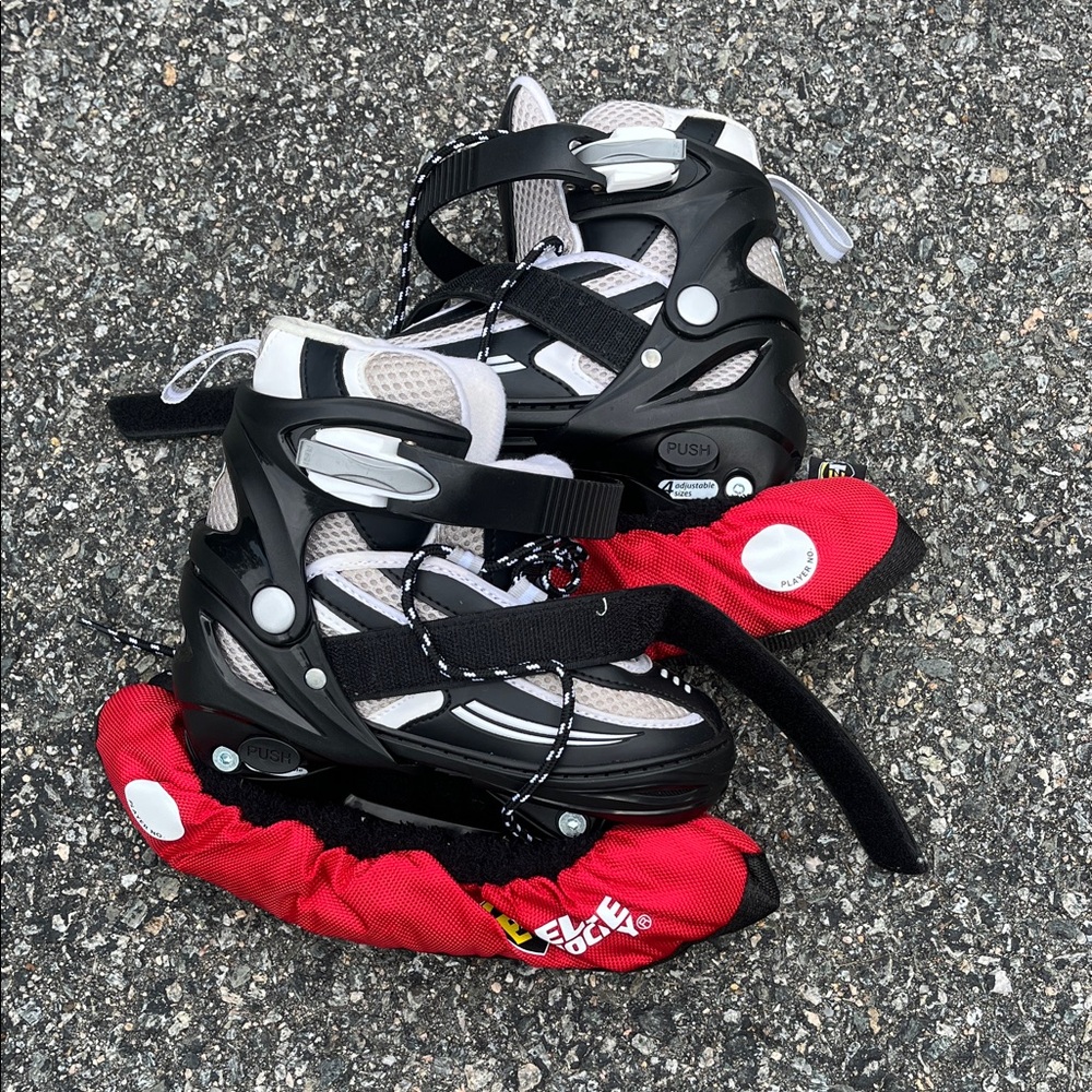 Black and Gray Rollerblades with Red Covers